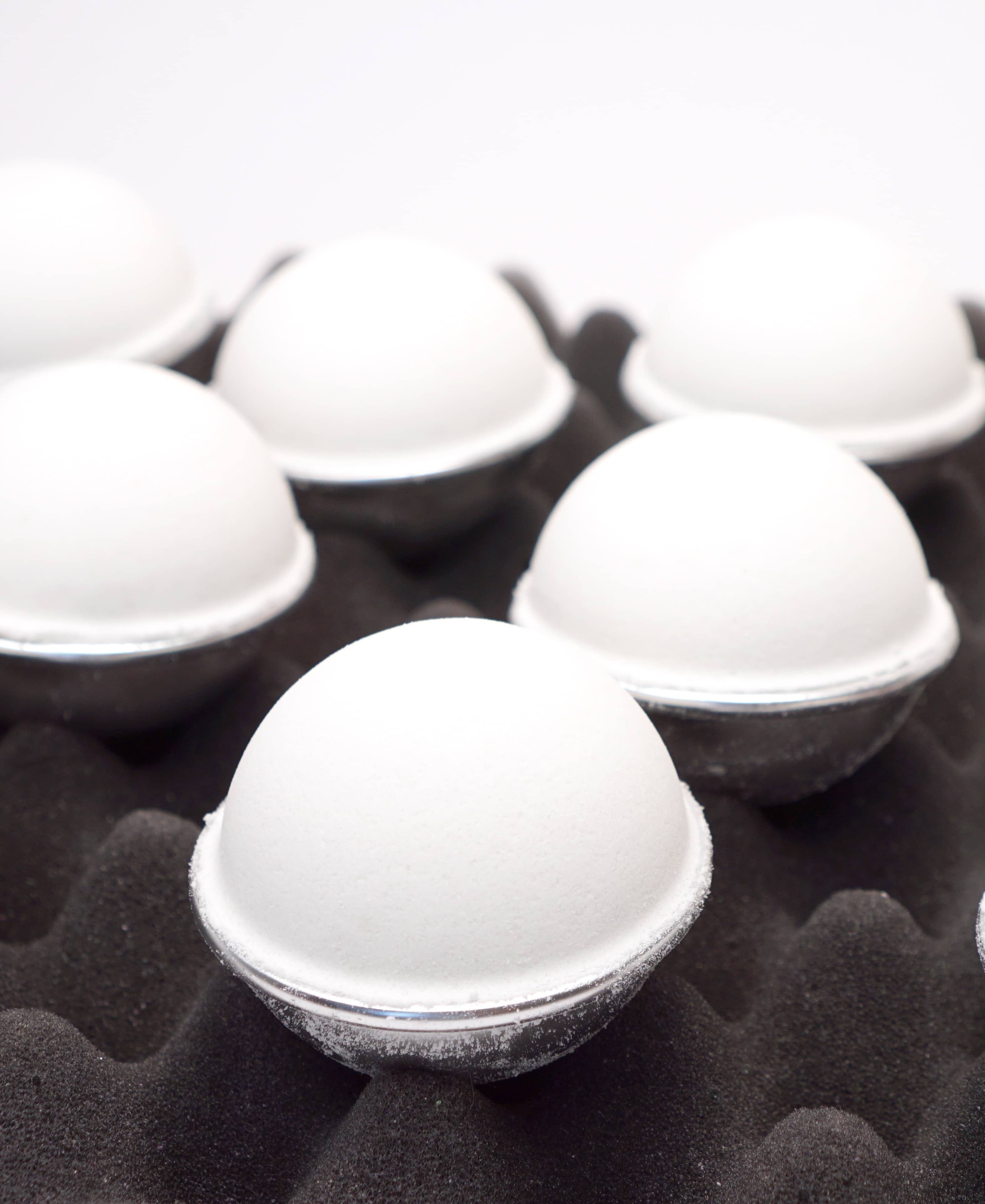 Bath bombs drying on egg crate foam