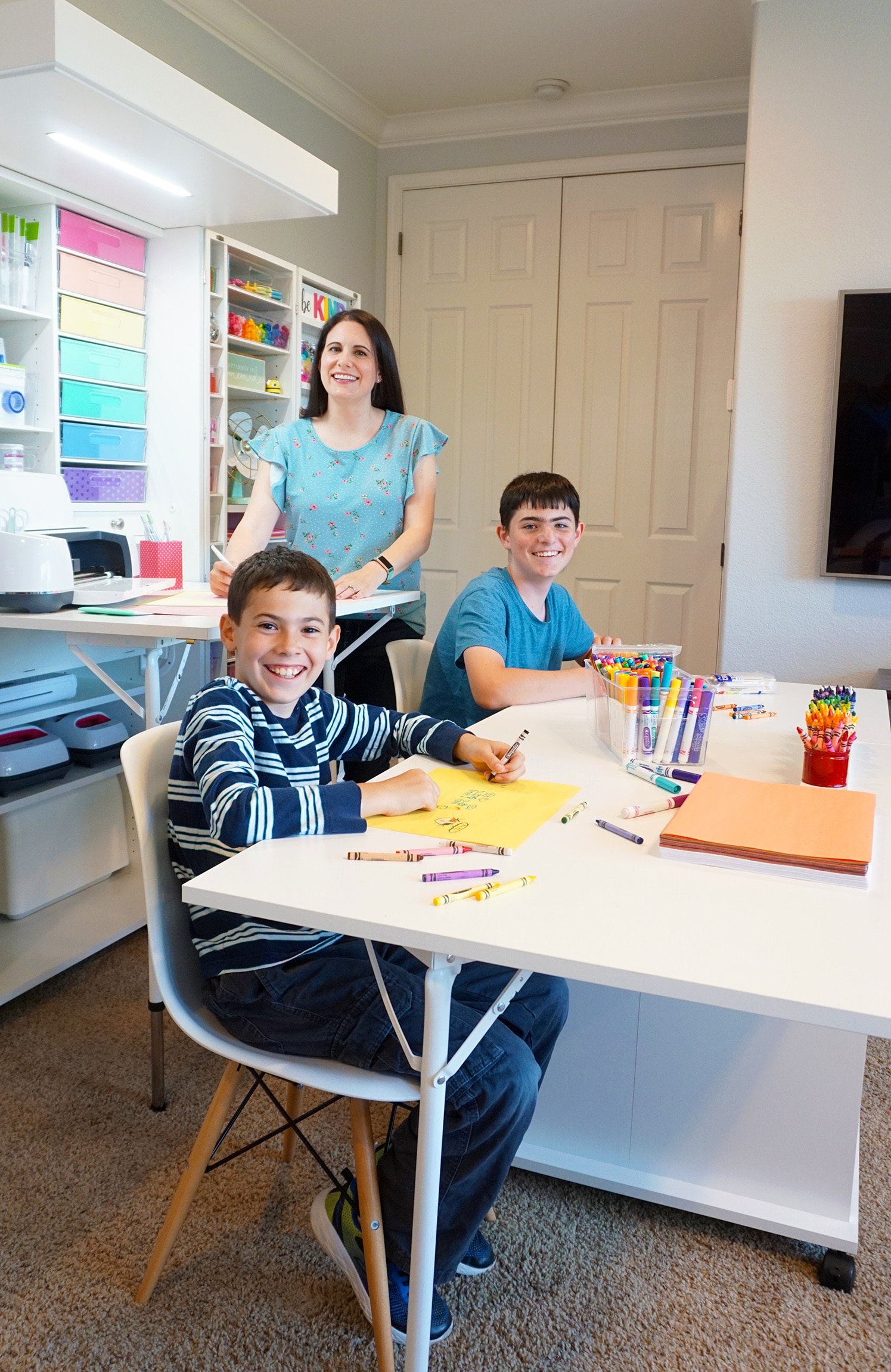 children using the dreamcart and mom using dreambox to craft