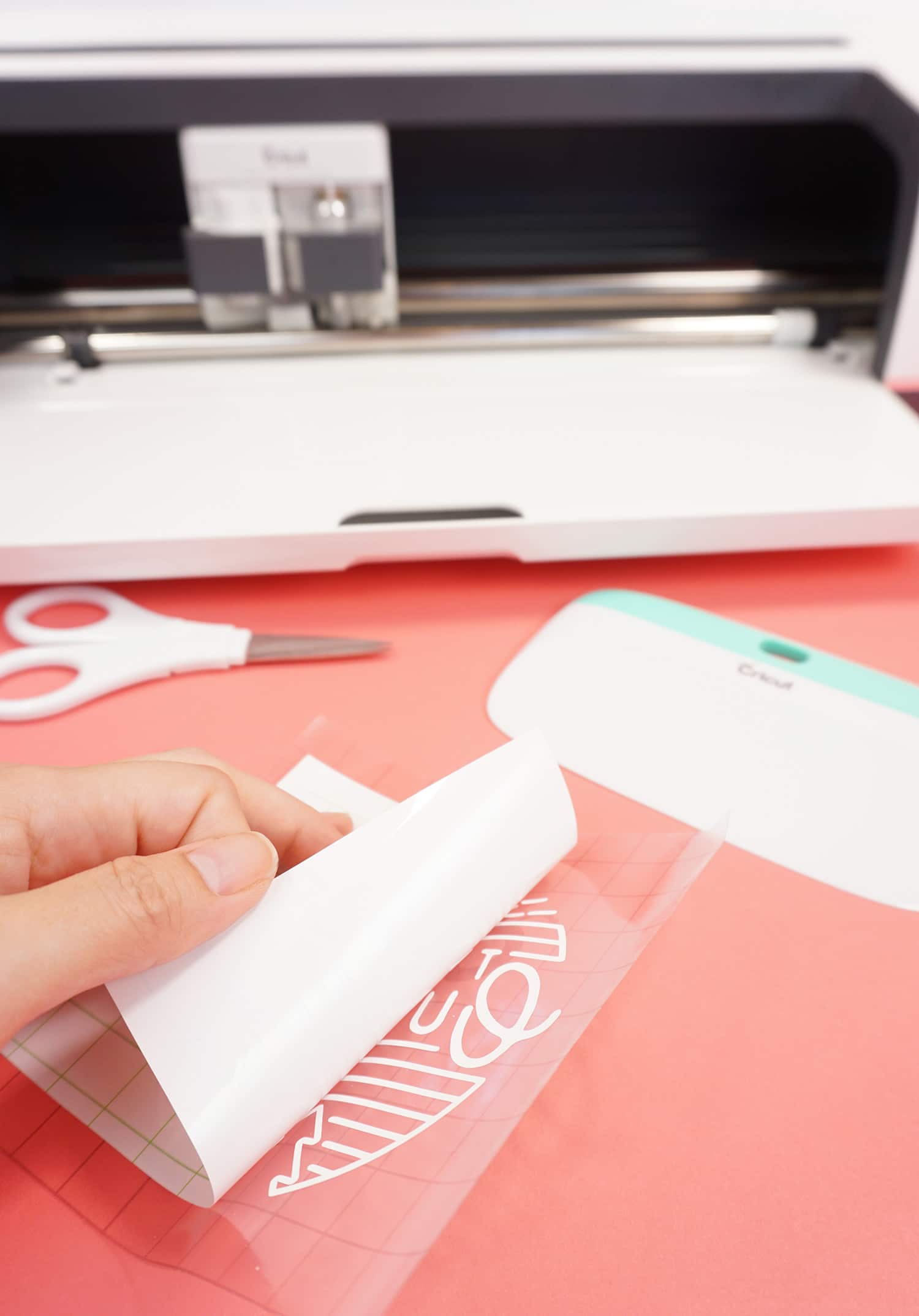 peeling back layer to reveal weeded image
