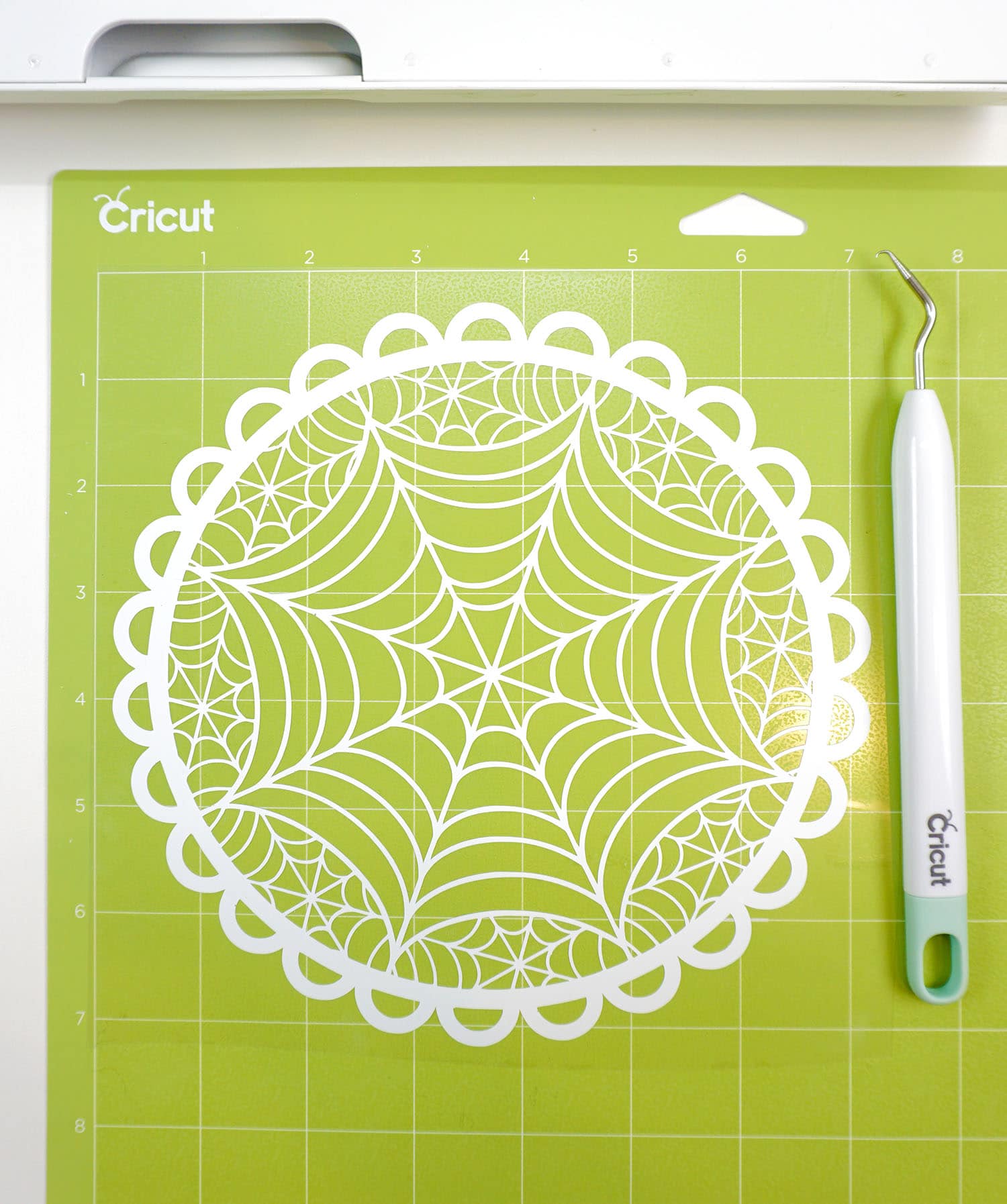 weeded design for spider web hoop art