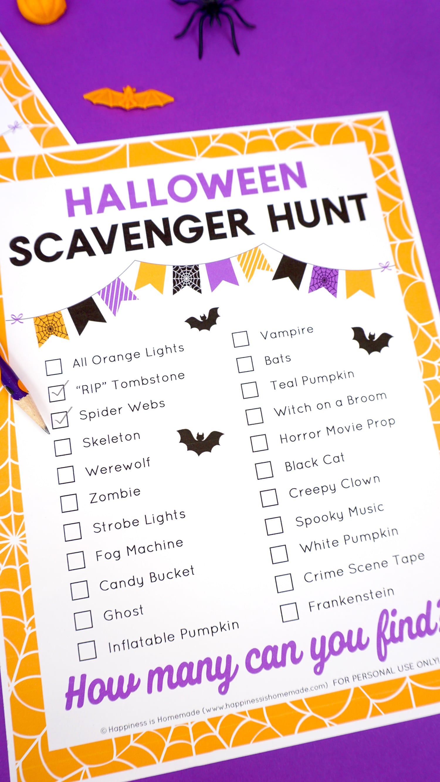 Close up of Halloween scavenger hunt printable checklist with "Spider Webs" and "RIP Tombstone" checked off