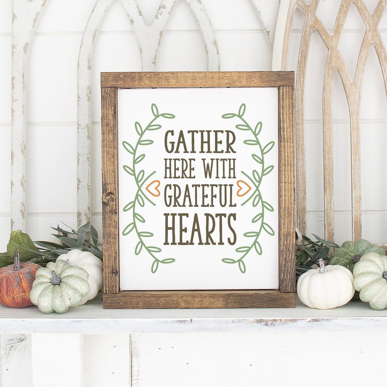 gather here with grateful hearts sign made from svg file with pumpkins on mantle