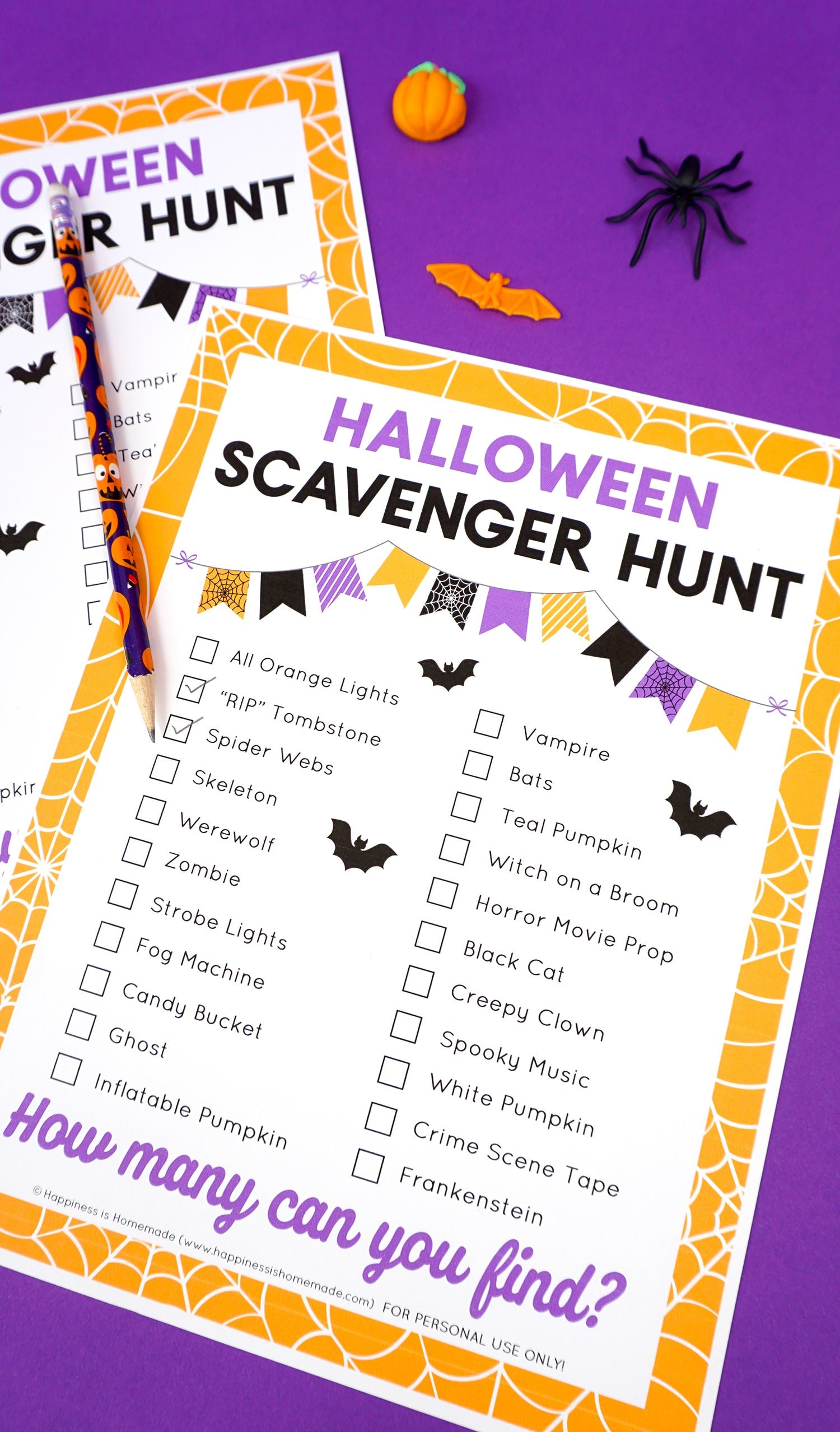 Close up of printable Halloween scavenger hunt game with Halloween novelty pencil on a purple background