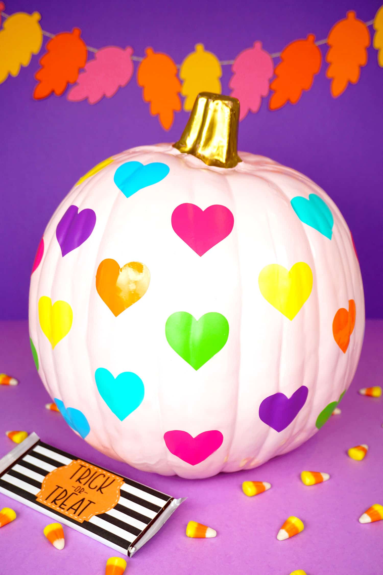 rainbow heart stamped pumpkins for halloween