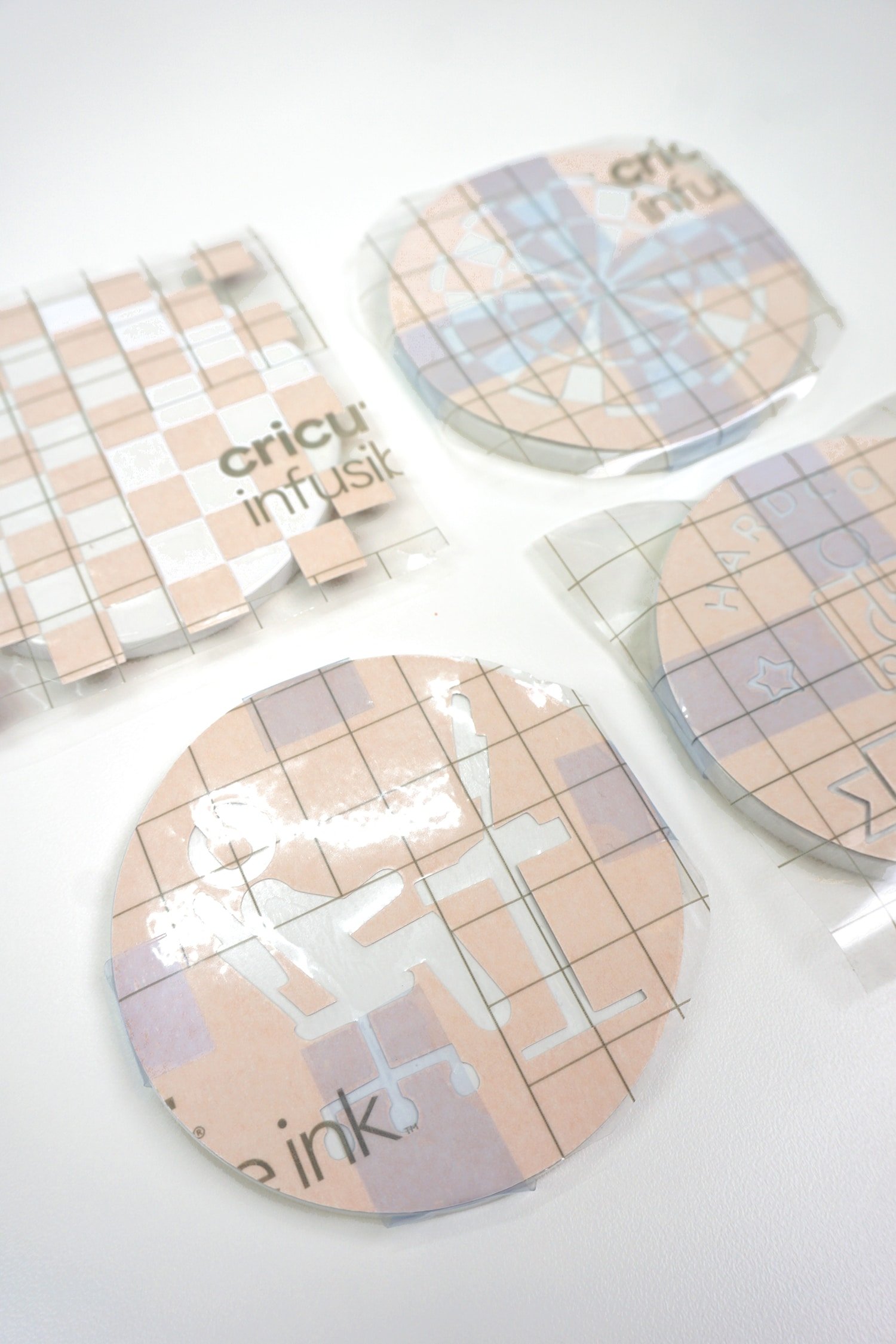 cricut designs added to blank white coasters
