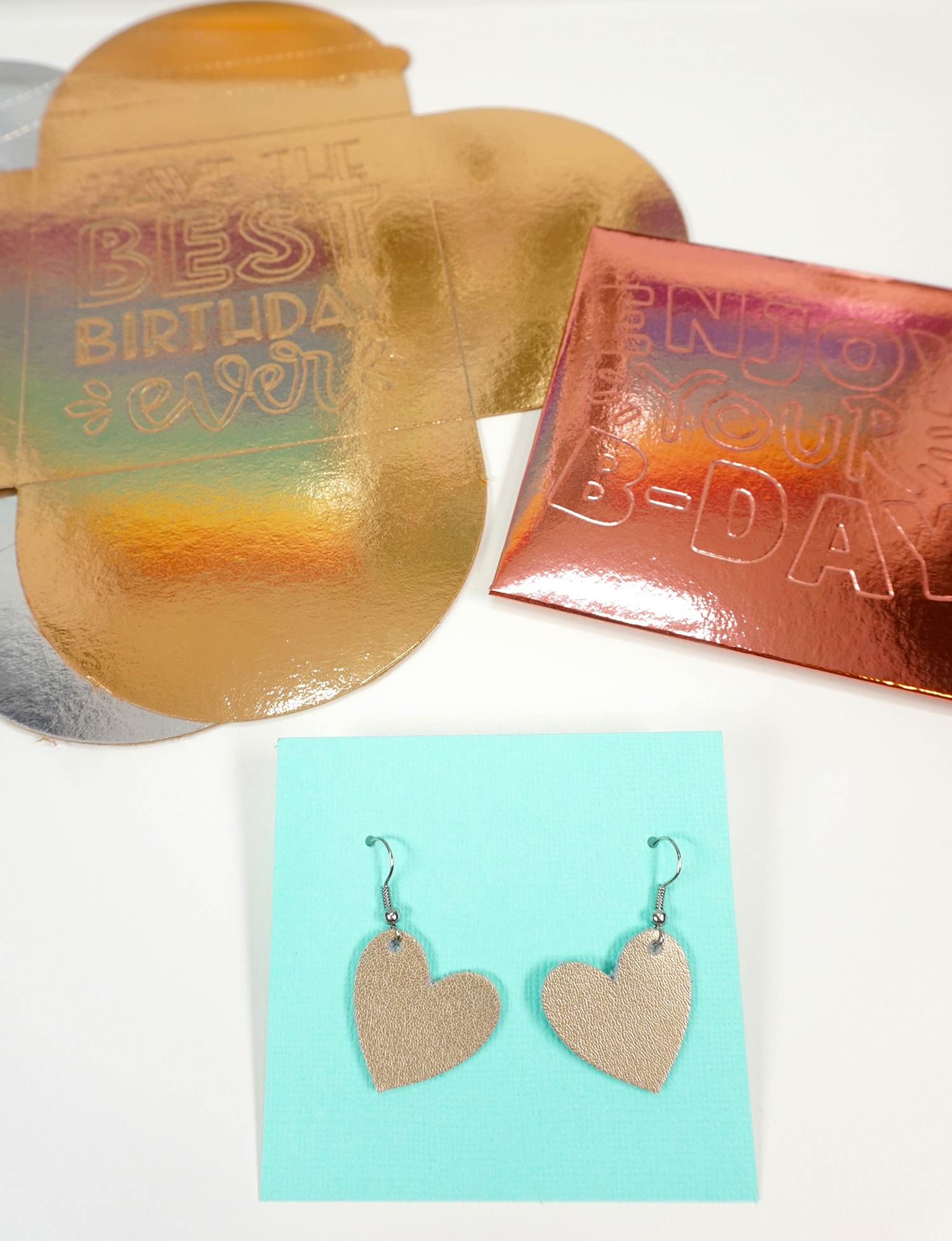 leather heart earrings made with cricut and gift card holders
