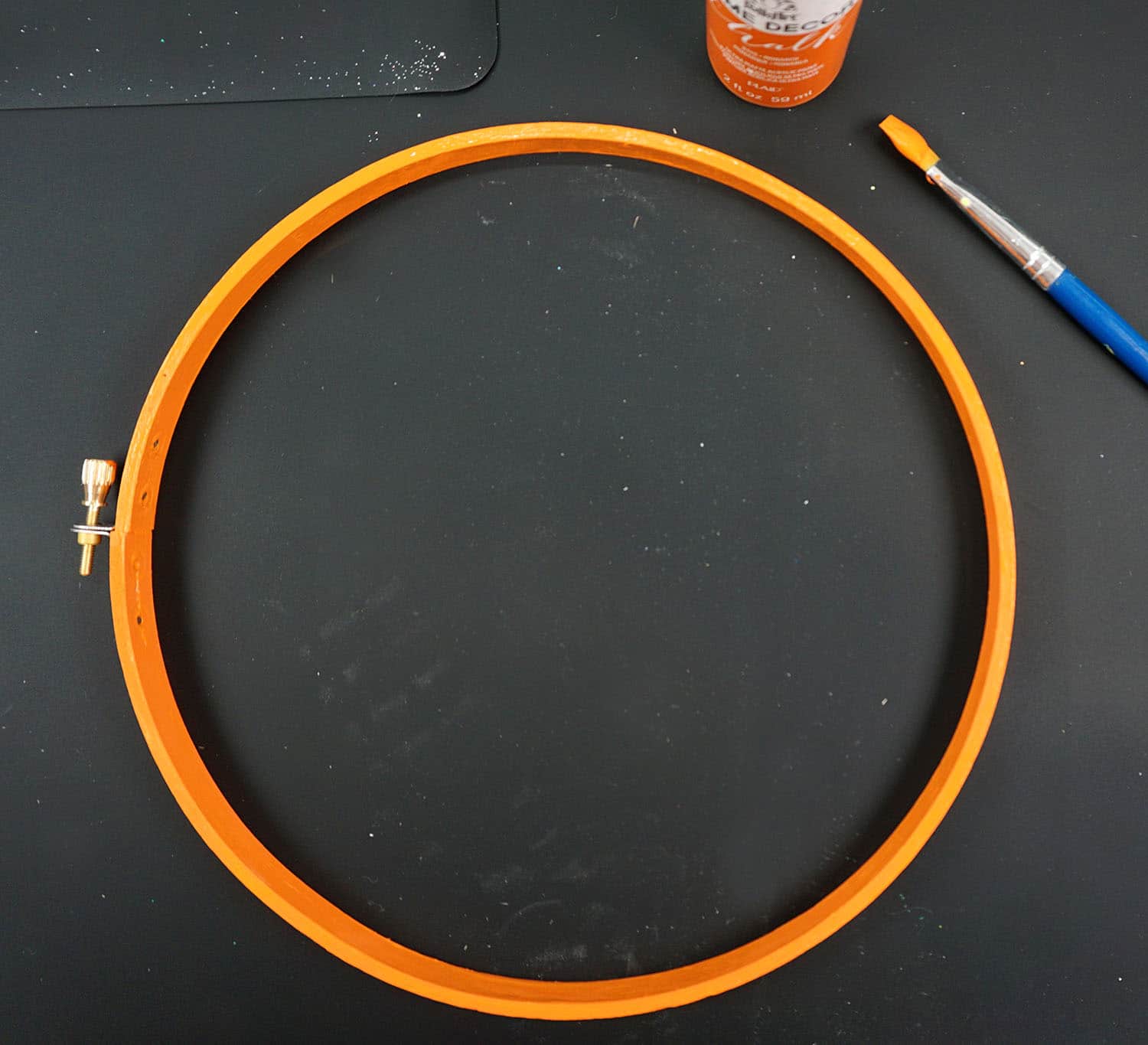 painted orange embroidery hoop