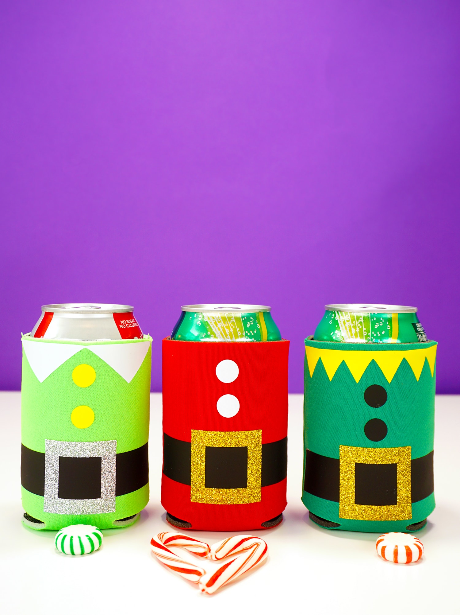 christmas drink koozies on cans of soda