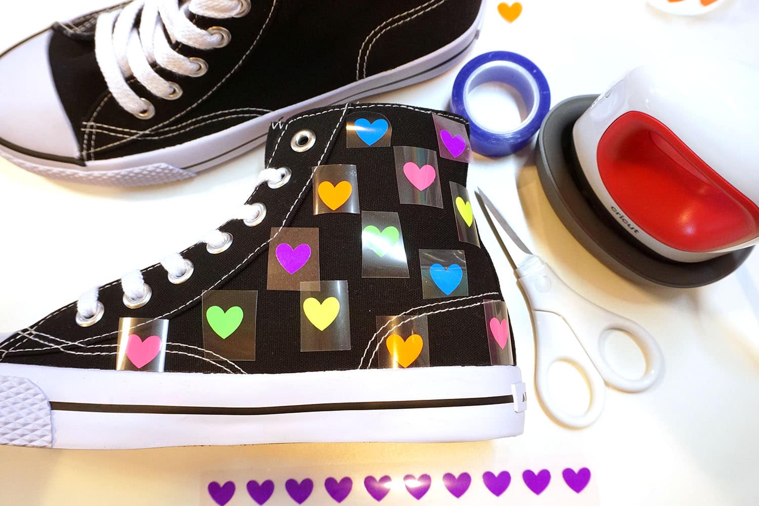 iron on heart applied to shoes