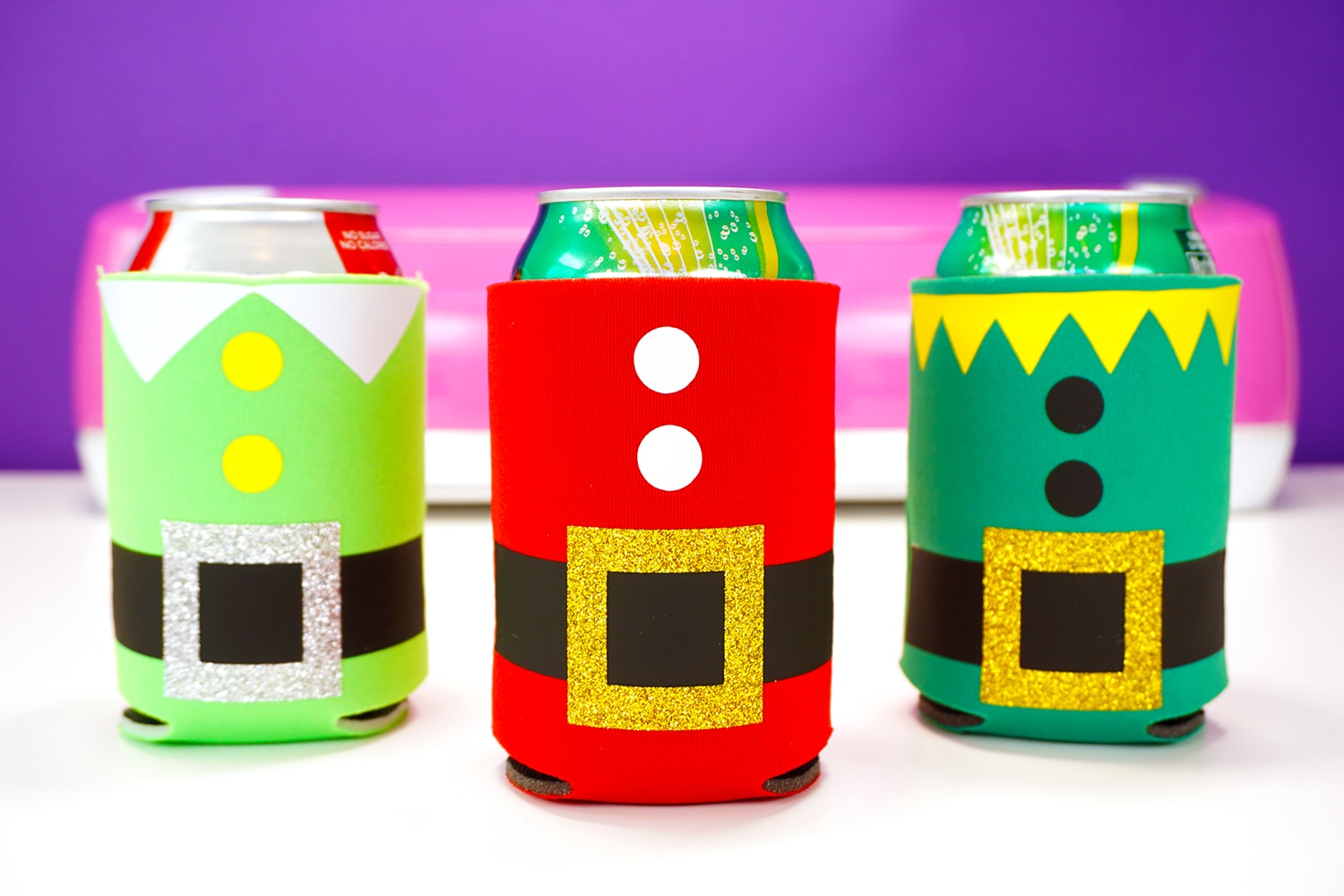 christmas drink koozies on cans of soda