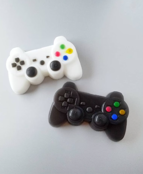 two game controller soaps in black and white