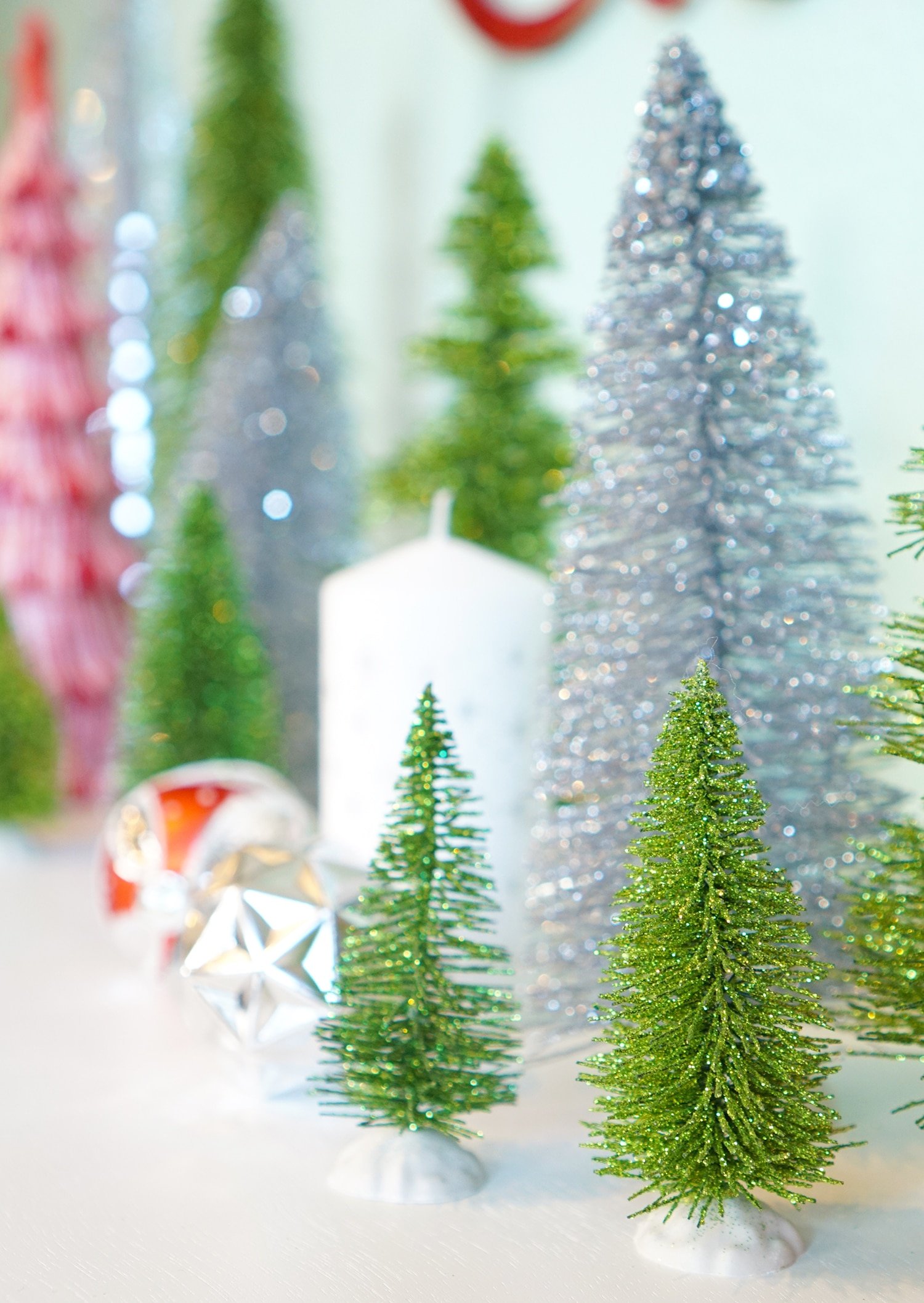 small glitter christmas trees and candles