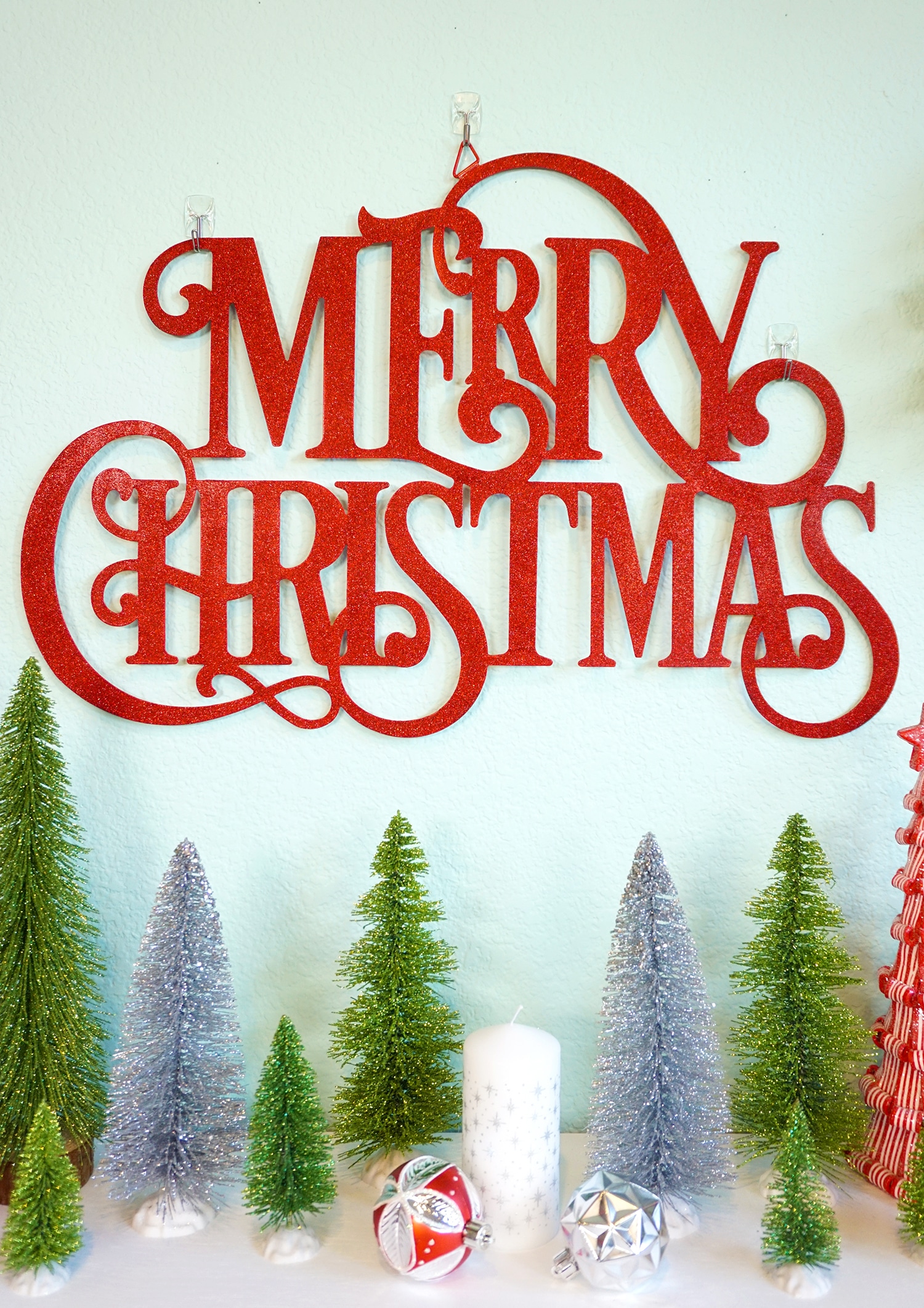 merry christmas sign and christmas tree decorations