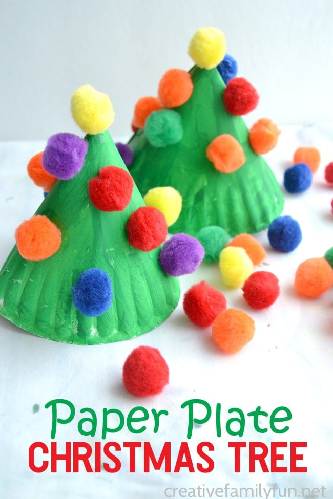 paper plates decorated and folded into christmas trees