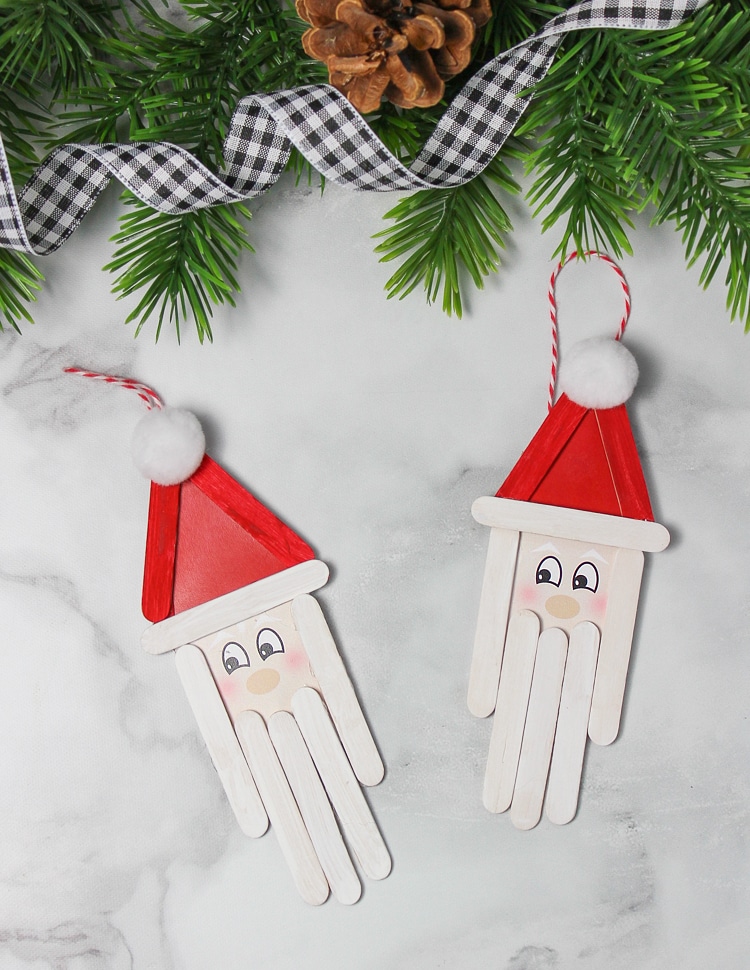 santa head ornaments made from craft sticks