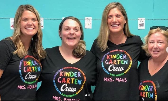 teachers wearing kinder garten crew shirts