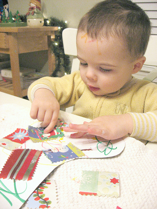 toddler making stockings 