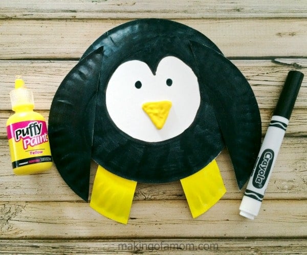 penguin made from paper plates with black marked and puffy paint