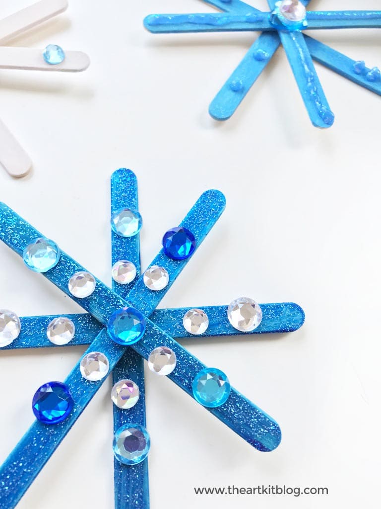 Super Fun & Easy DIY Popsicle Stick Snowflake Craft - The Frugal