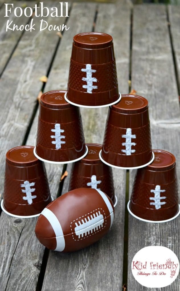 solo cup stacking game with football prints on cups and mini football