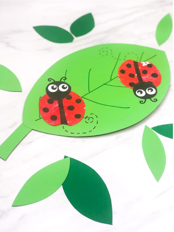 apple stamp ladybugs on  paper leaves