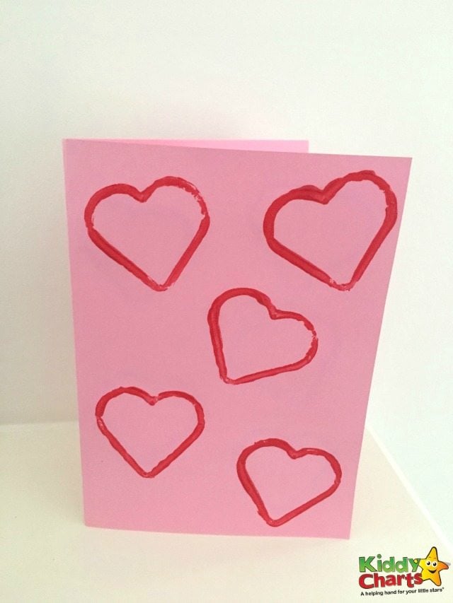 cookie cutter heart shapes stamped on paper