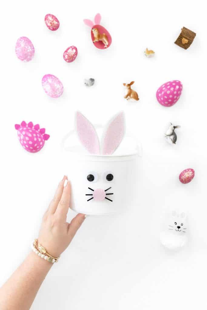 cute DIY bunny baskets held up along with easter decorations
