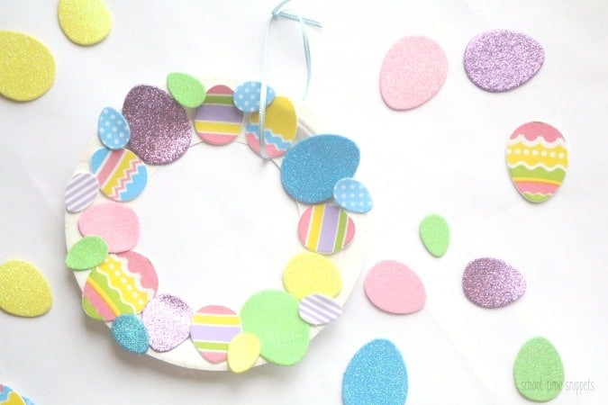pastel easter eggs covering easter wreath craft