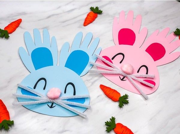 colorful handprint easter bunnies with tiny carrots