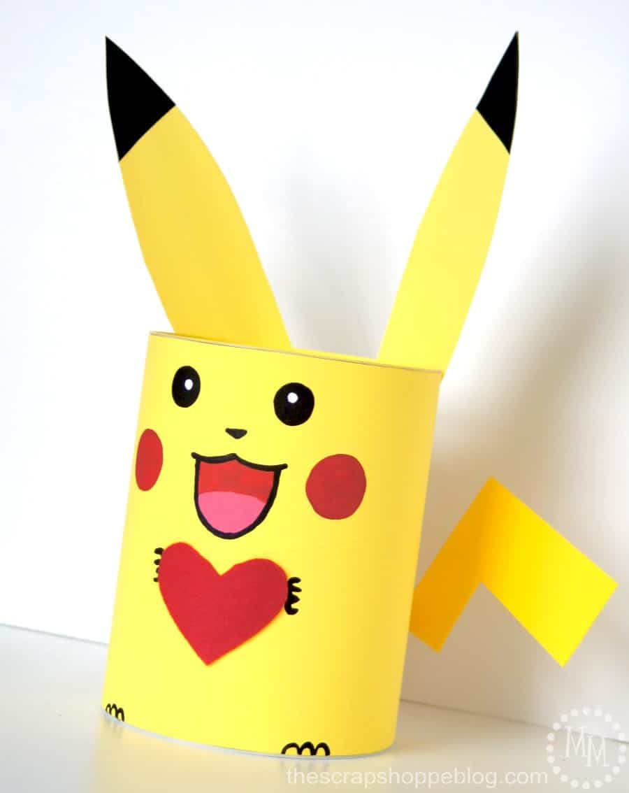 pikachu holding a heart valentines day box