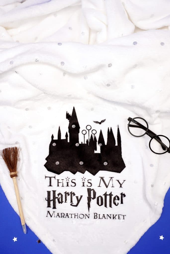 Harry Potter marathon file on white blanket
