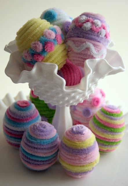 spring decorated easter eggs in cupcake tier