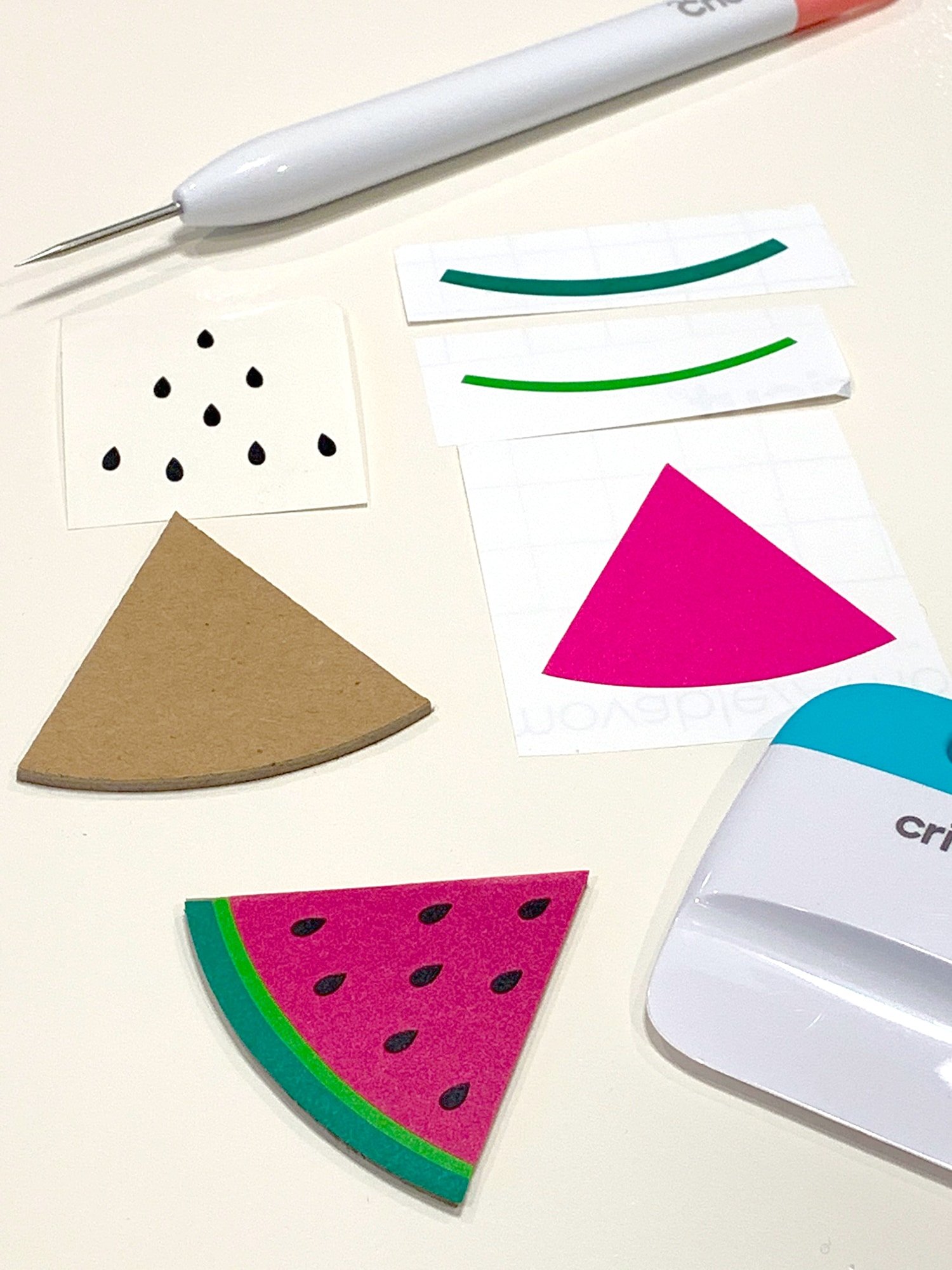 pieces for making the watermelon slice earrings with cricut