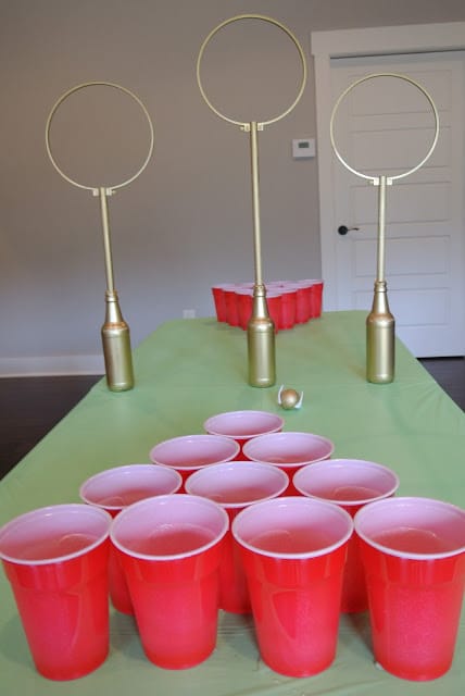 Quidditch inspired beer pong table setup using embroidery hoops for the Quidditch goals