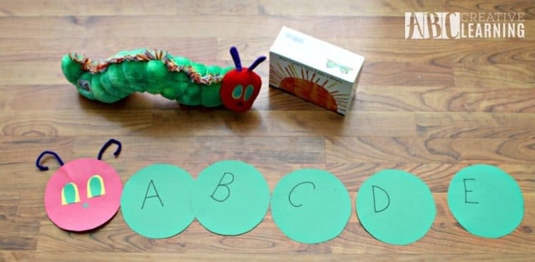 caterpillar alphabet activity on table with caterpillar
