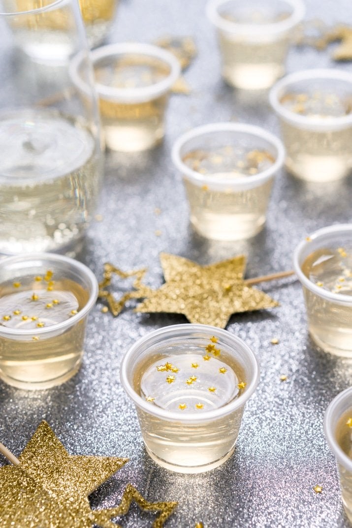 champagne jello shots with sparkly gold star wands