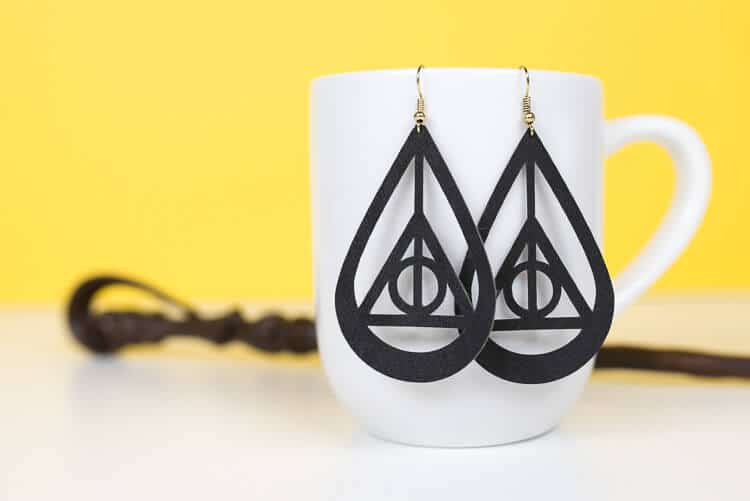 Deathly Hallows earrings made by Cricut