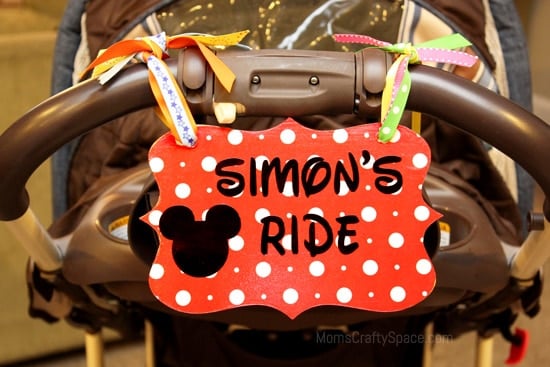 simons ride strolled disney themed sign