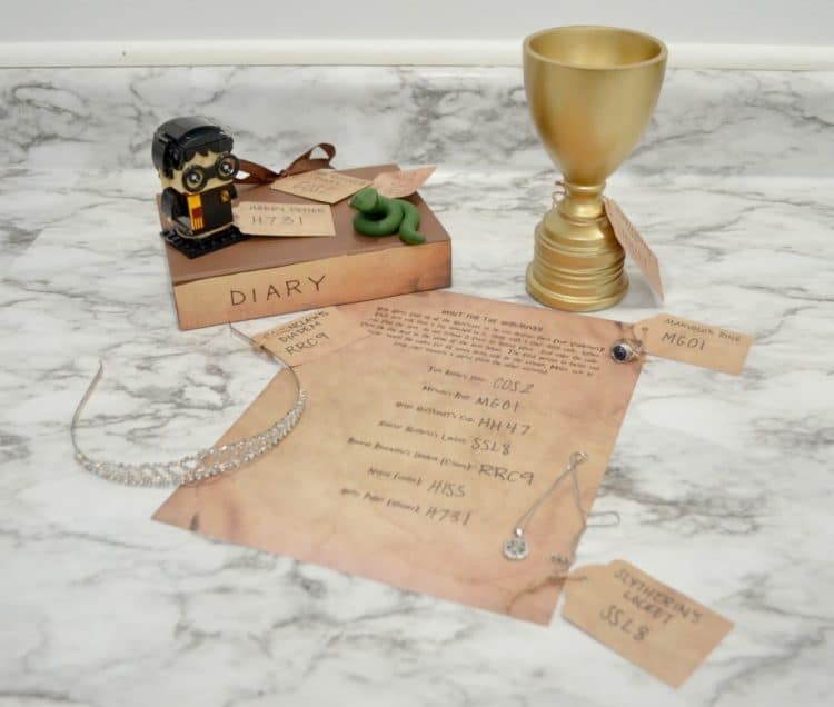 harry potter Tom Riddle diary, golden goblet and old parchment paper with tags