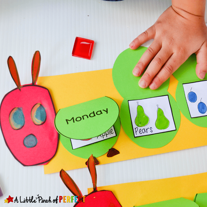 hungry caterpillar flap book being played with