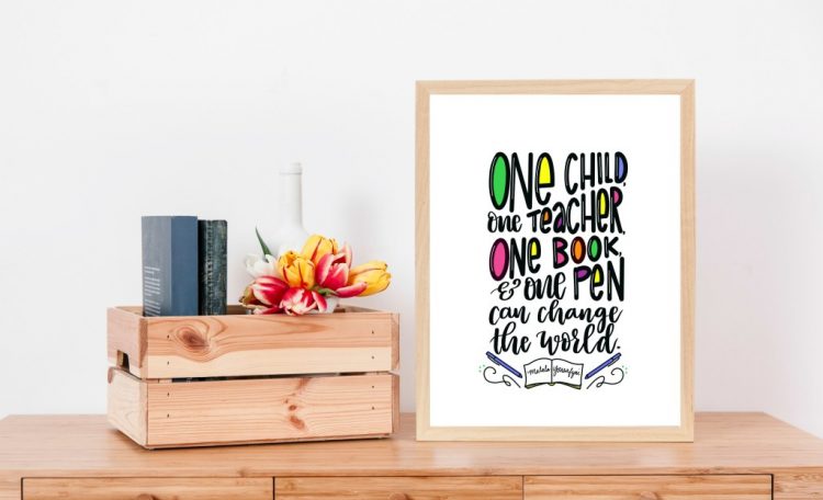 one teacher printable in frame on desk 