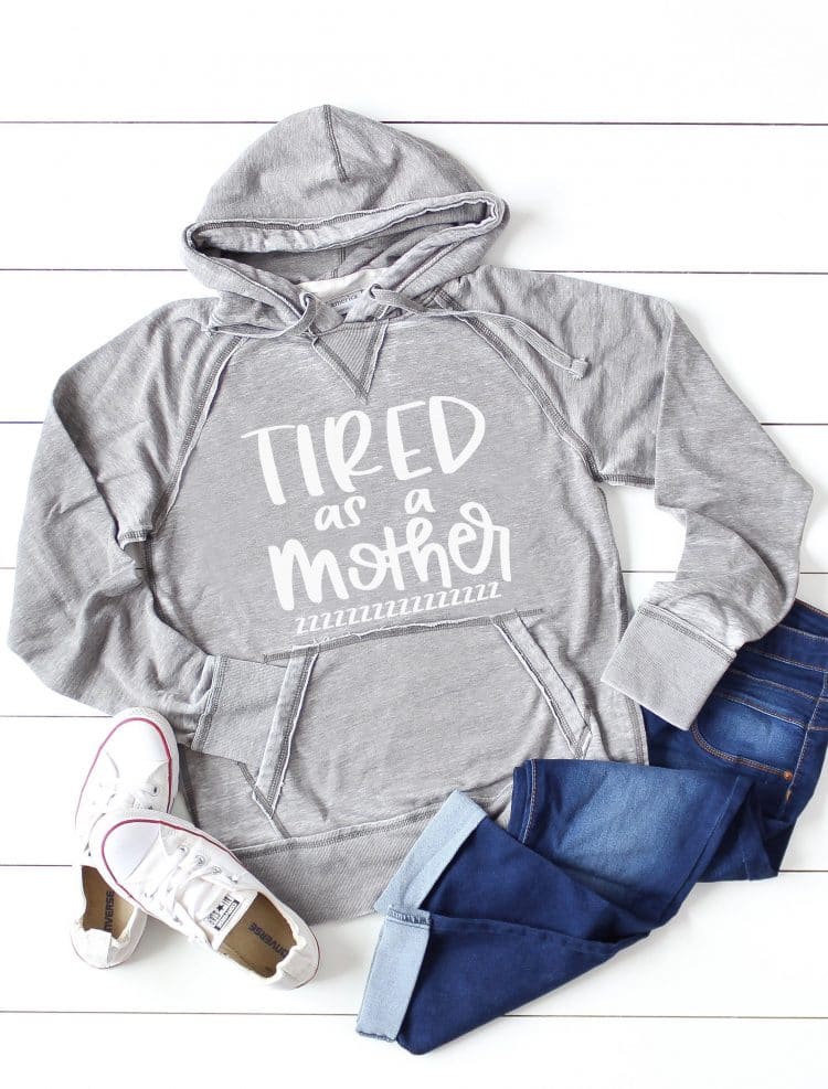tired as a mother svg file on grey sweatshirt with accessories