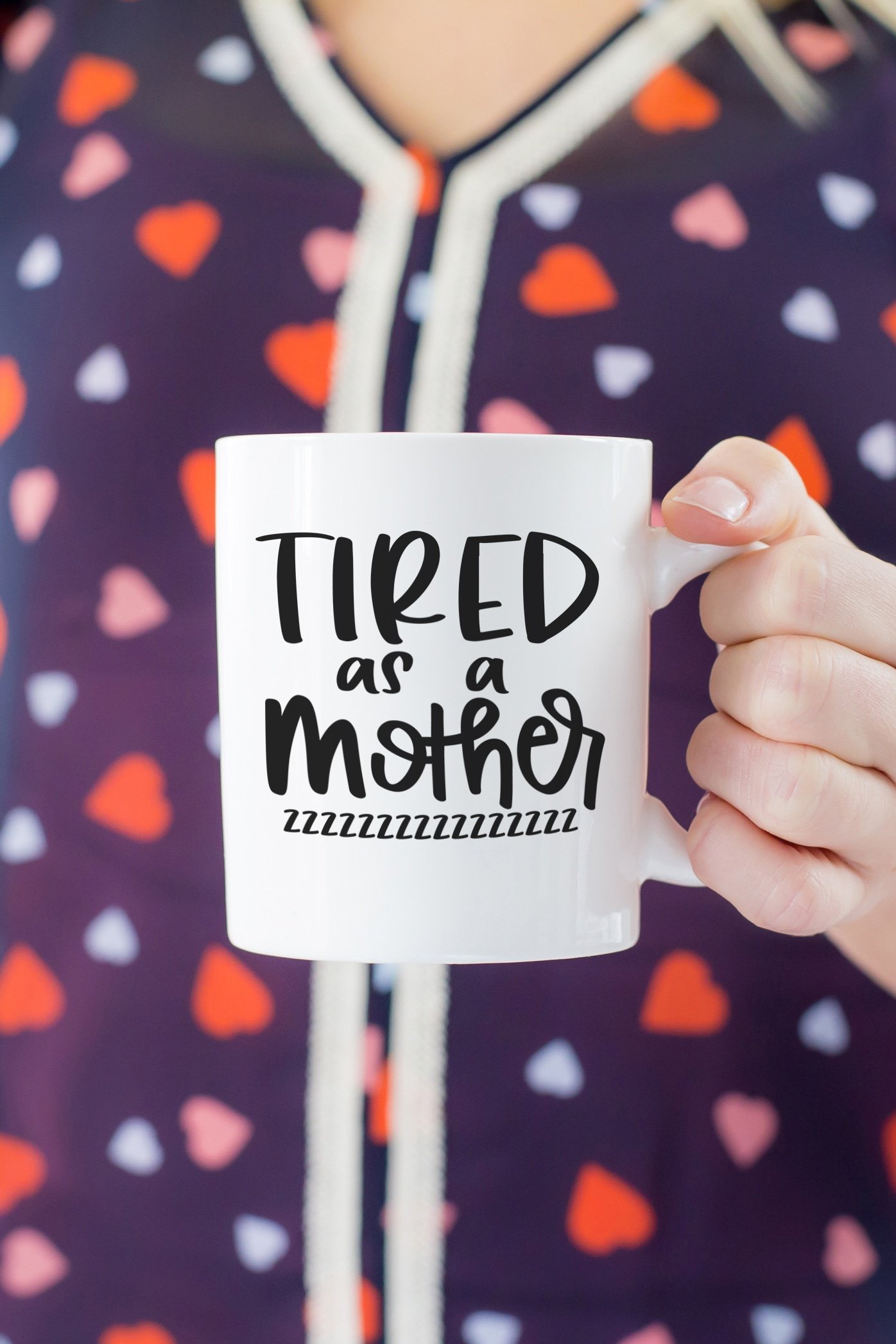 tired as a mother svg file on mug being held