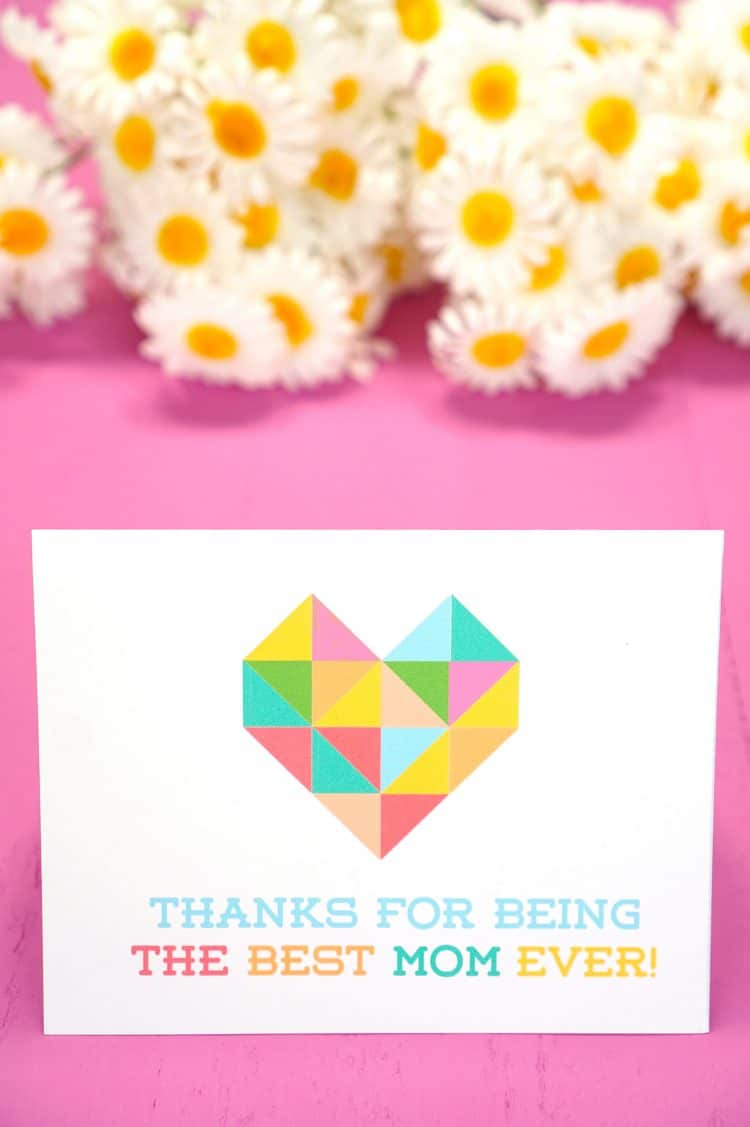 printable geometric heart card for mothers day with flowers in background