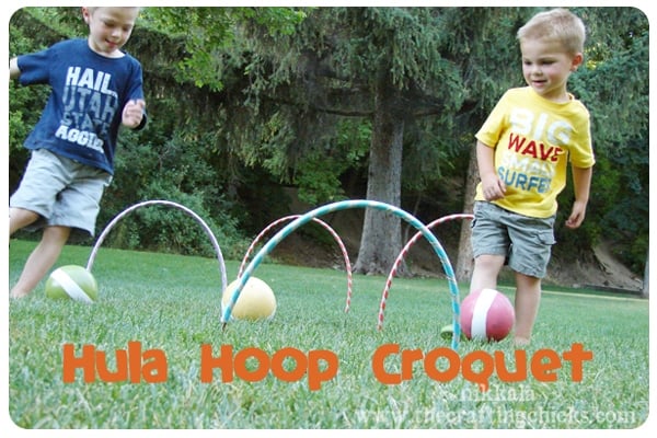 hula hoop croquet game being played by kids