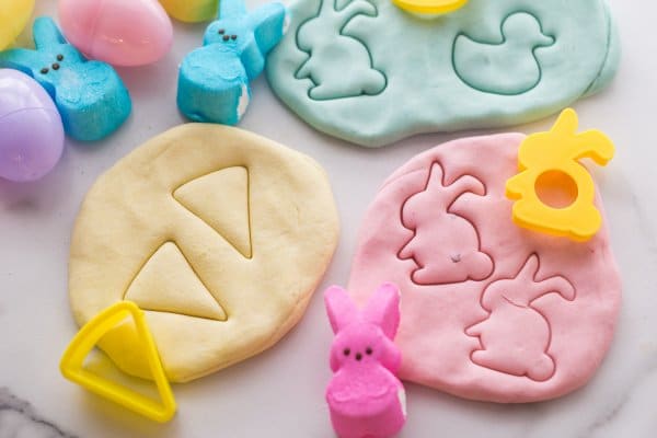 easter shapes cut into pastel colored playdough