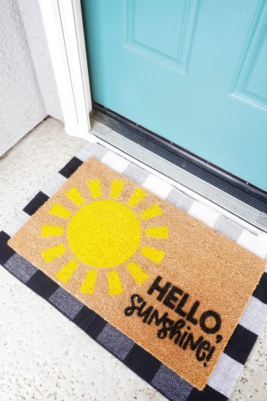 hello sunshine doormat in front of door