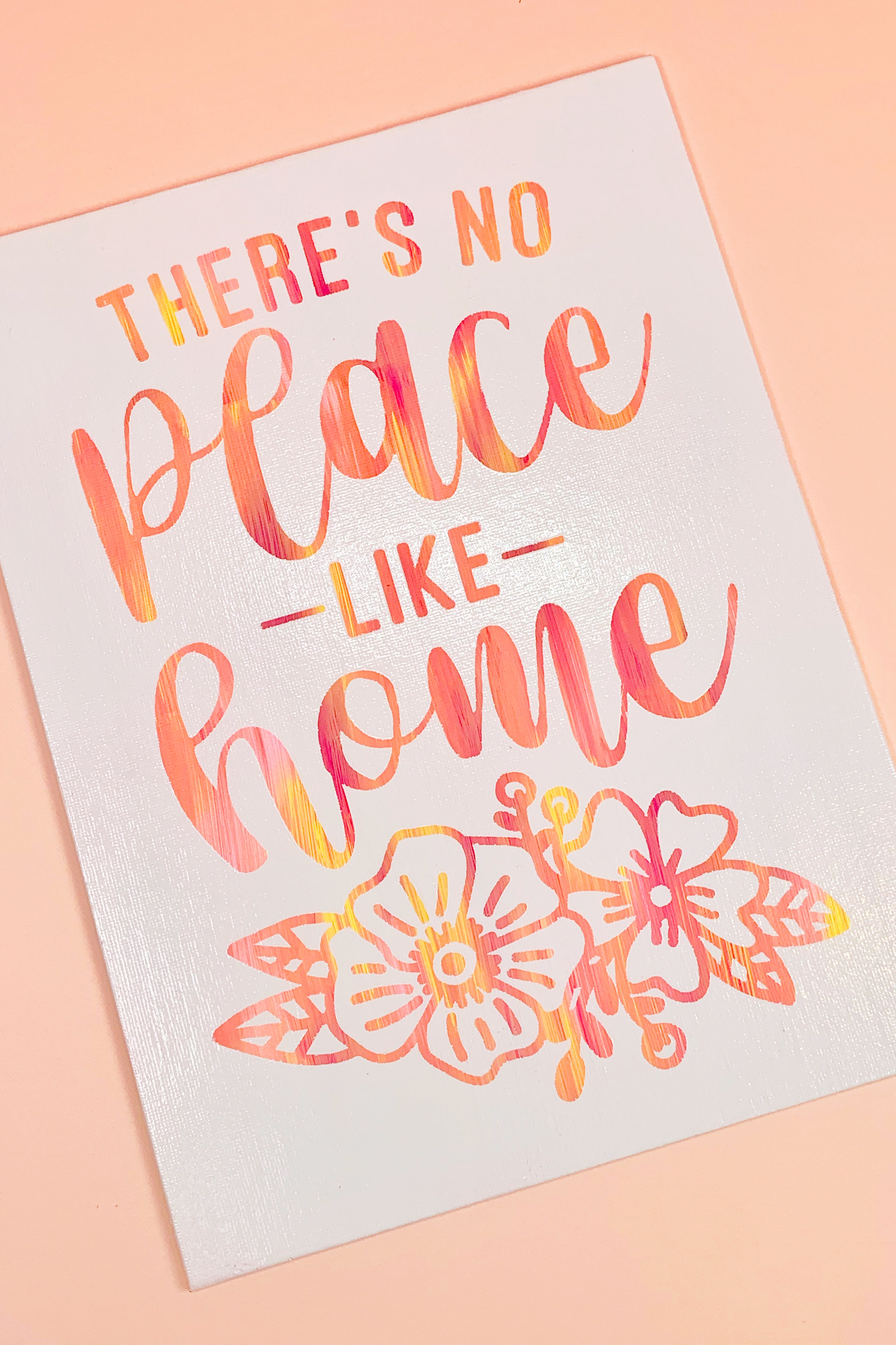 Completed white hot mess canvas with sunset-hued "There's No Place Like Home" quote