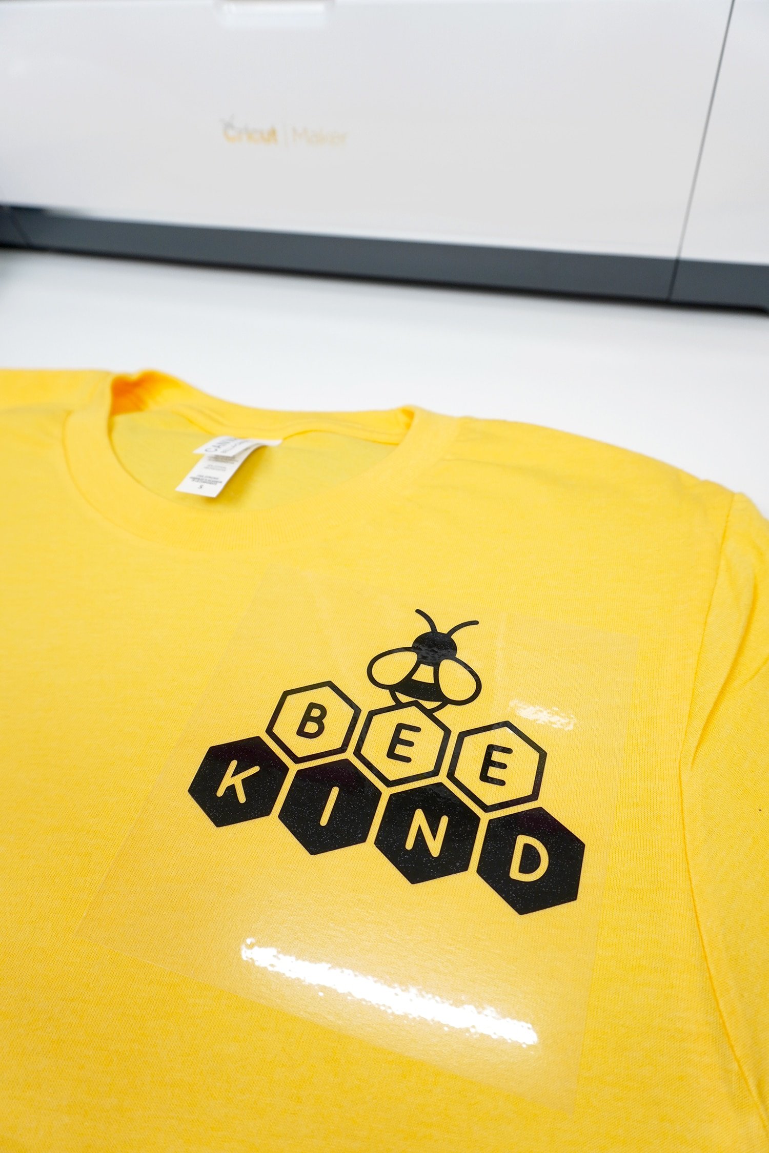 bee kind image on yellow tshirt