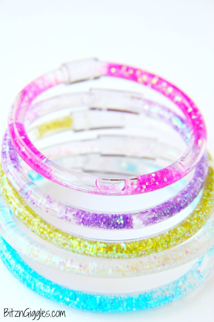 glittery friendship bracelets in a stack